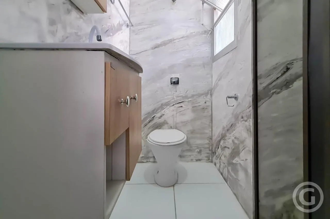 Apartamento de 54 m² com 2 dormitórios e fogão elétrico — photo 9