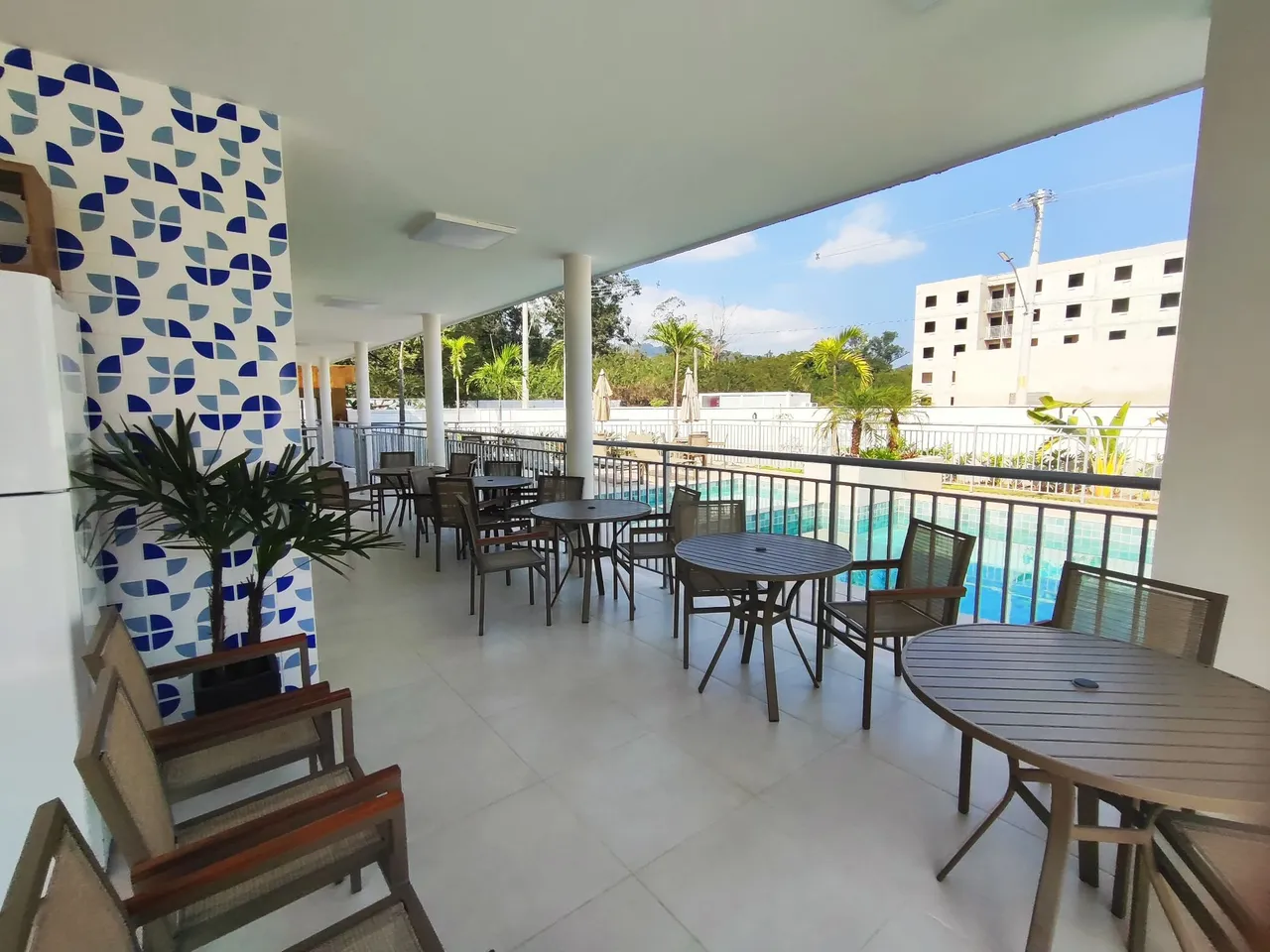 2-bedroom apartment in a building with a pool — photo 9