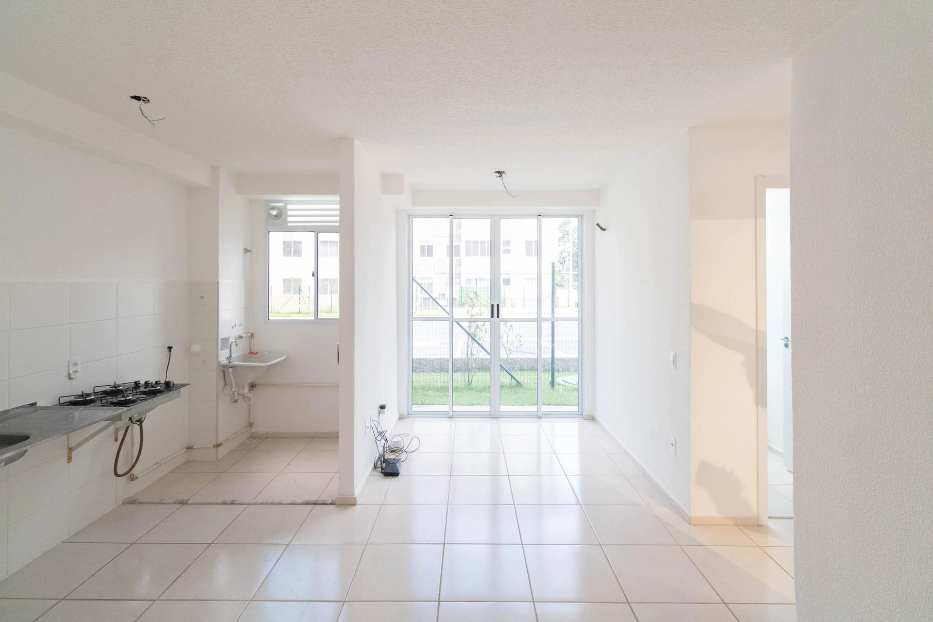 2-bedroom apartment in a building with a pool — photo 3