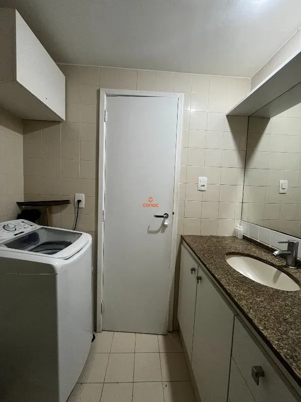 One-bedroom apartment with a washing machine — photo 13