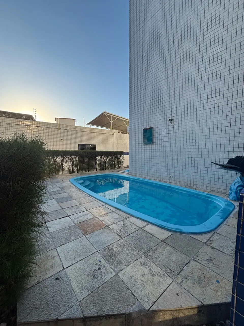3-bedroom apartment in a building with a pool — photo 9