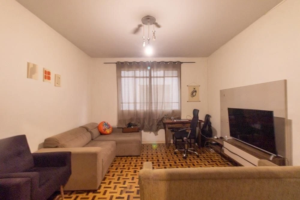 Furnished 2-bedroom apartment with desk workspace corner