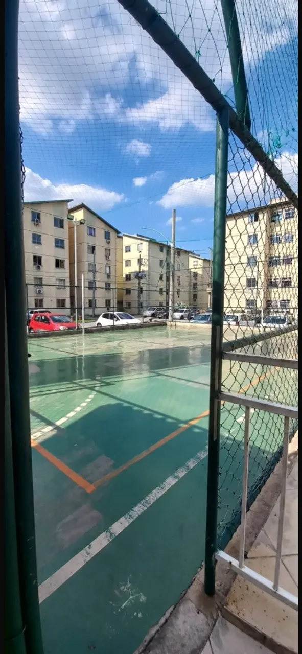 2-bedroom apartment in a building with a pool — photo 3