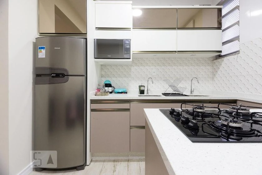 Furnished studio with open-plan kitchen and gas stove — photo 5