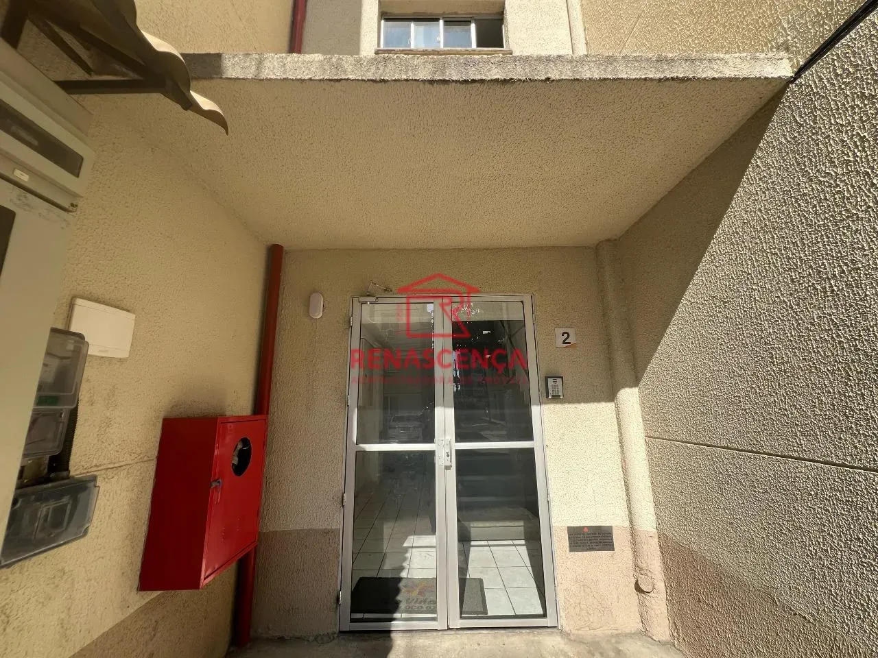 2-bedroom apartment in a building with a pool — photo 2