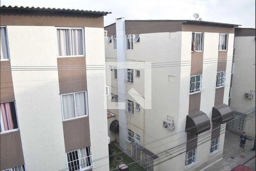 2-bedroom apartment in a building with a pool — photo 42
