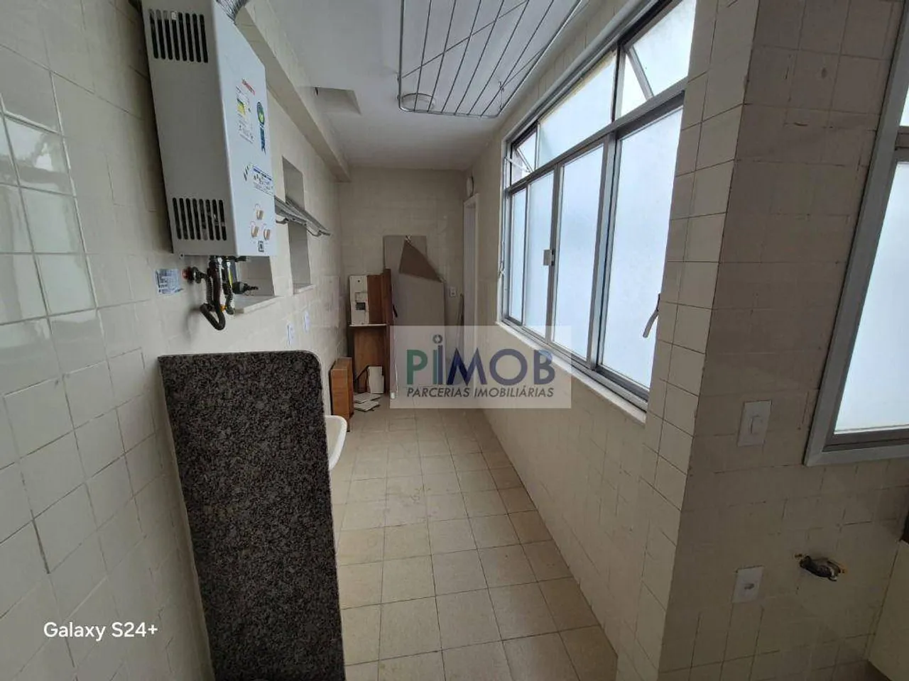Apartamento de 2 quartos e 104 m² com área de lavanderia — photo 8