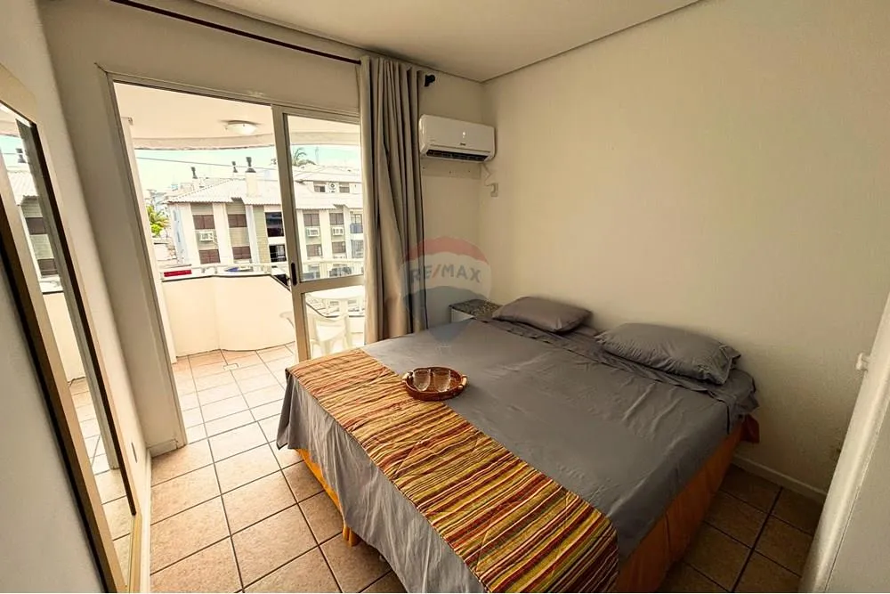 Furnished 1-bedroom apartment with balcony and water view
