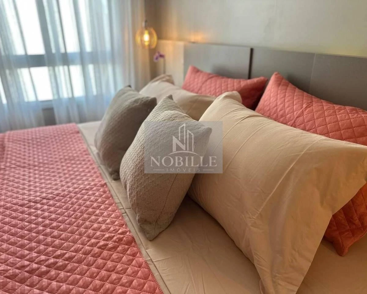 2-bedroom apartment in a building with a pool