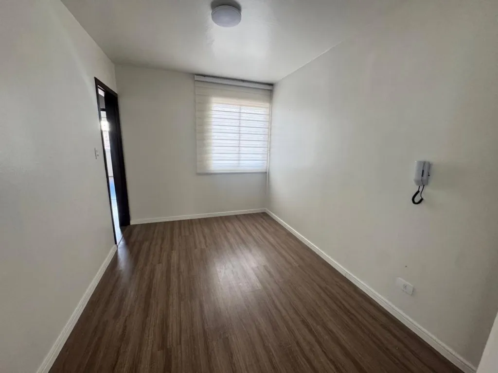 Wood or laminate floors in a 3-bedroom apartment, 64 m² — photo 8
