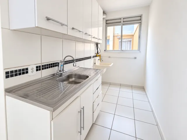 2-bedroom apartment in a building with a gym