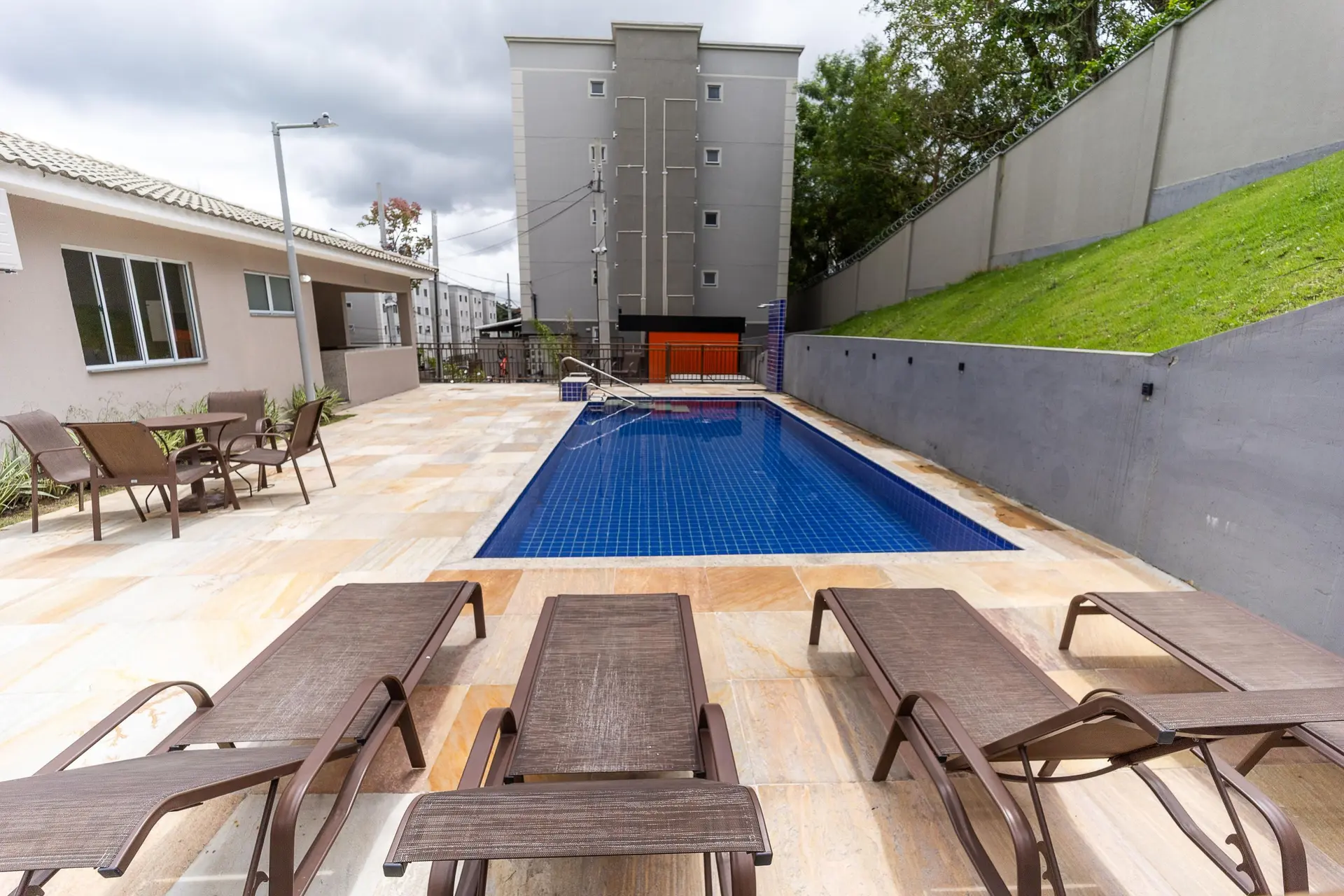 2-bedroom apartment in a building with a pool — photo 11