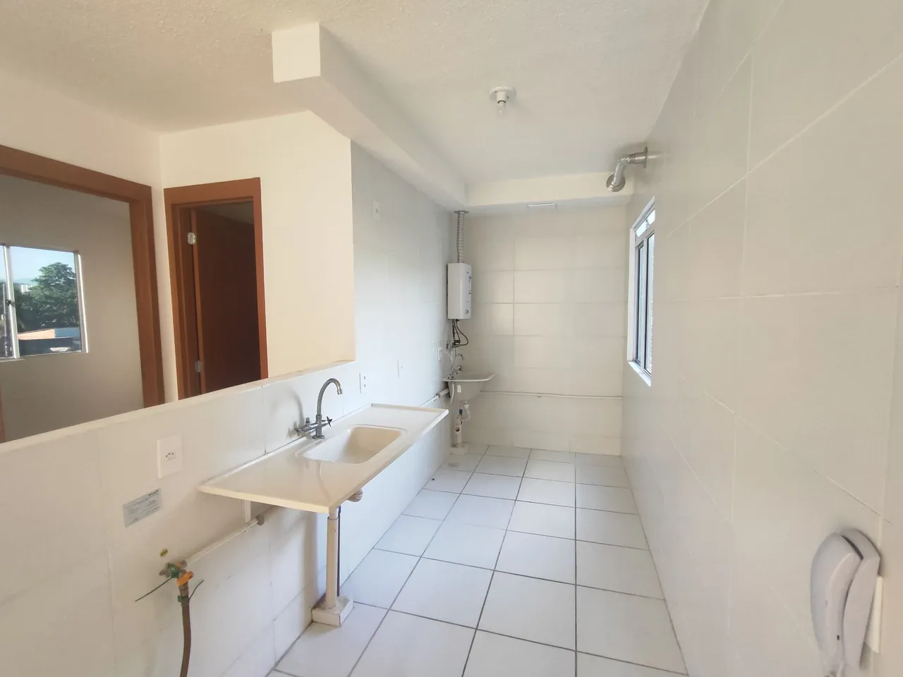 2-bedroom apartment in a building with a pool — photo 2