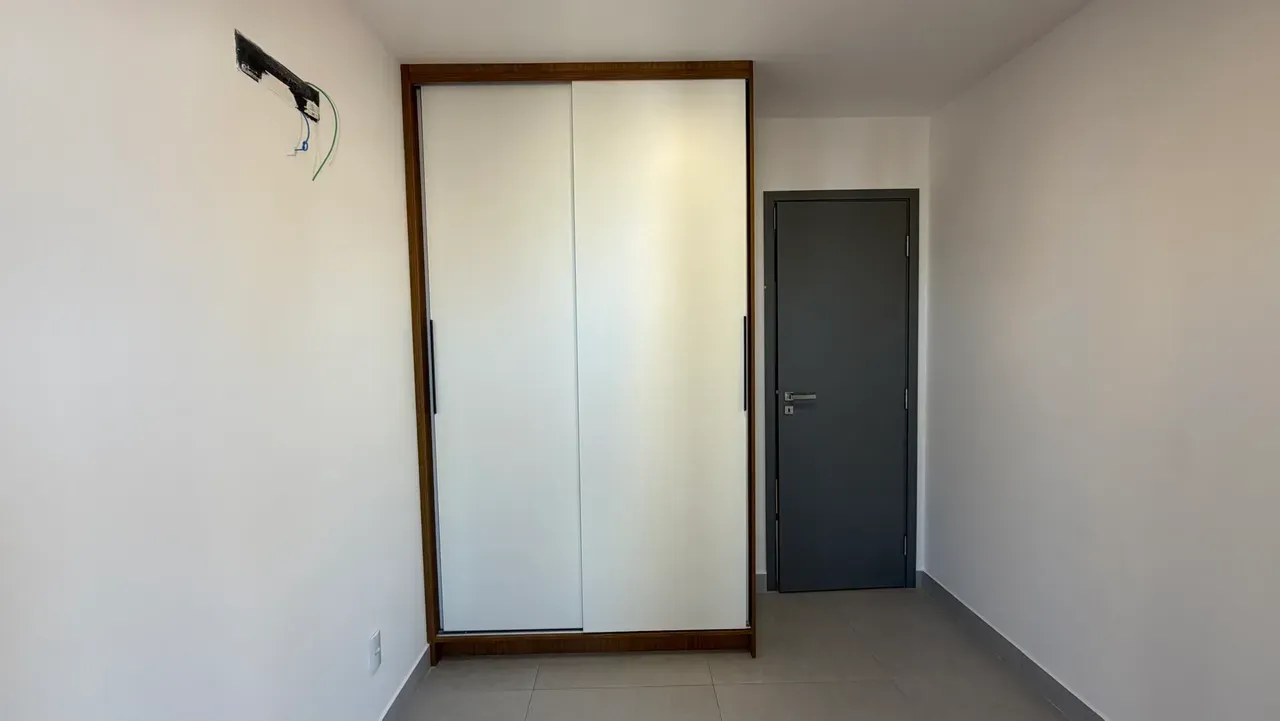 2-bedroom apartment in a building with a heated pool