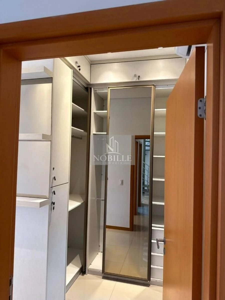 2-bedroom apartment in a building with a pool — photo 13