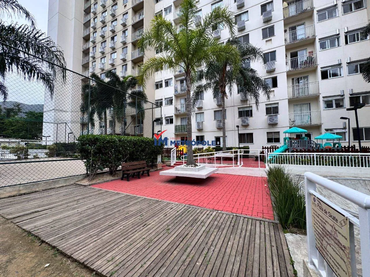 2-bedroom apartment in a building with a pool — photo 7
