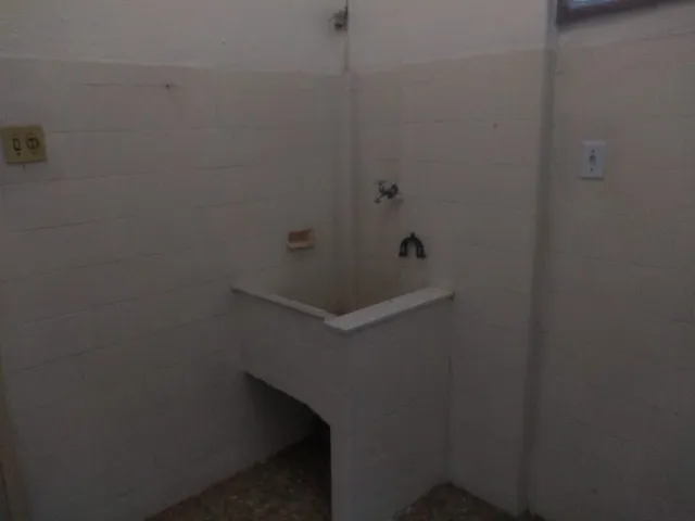 1-bedroom apartment with 1 parking space and laundry area — photo 5