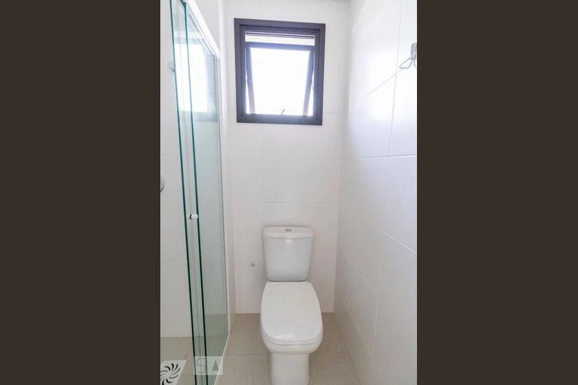 Unfurnished studio with open-plan kitchen and balcony