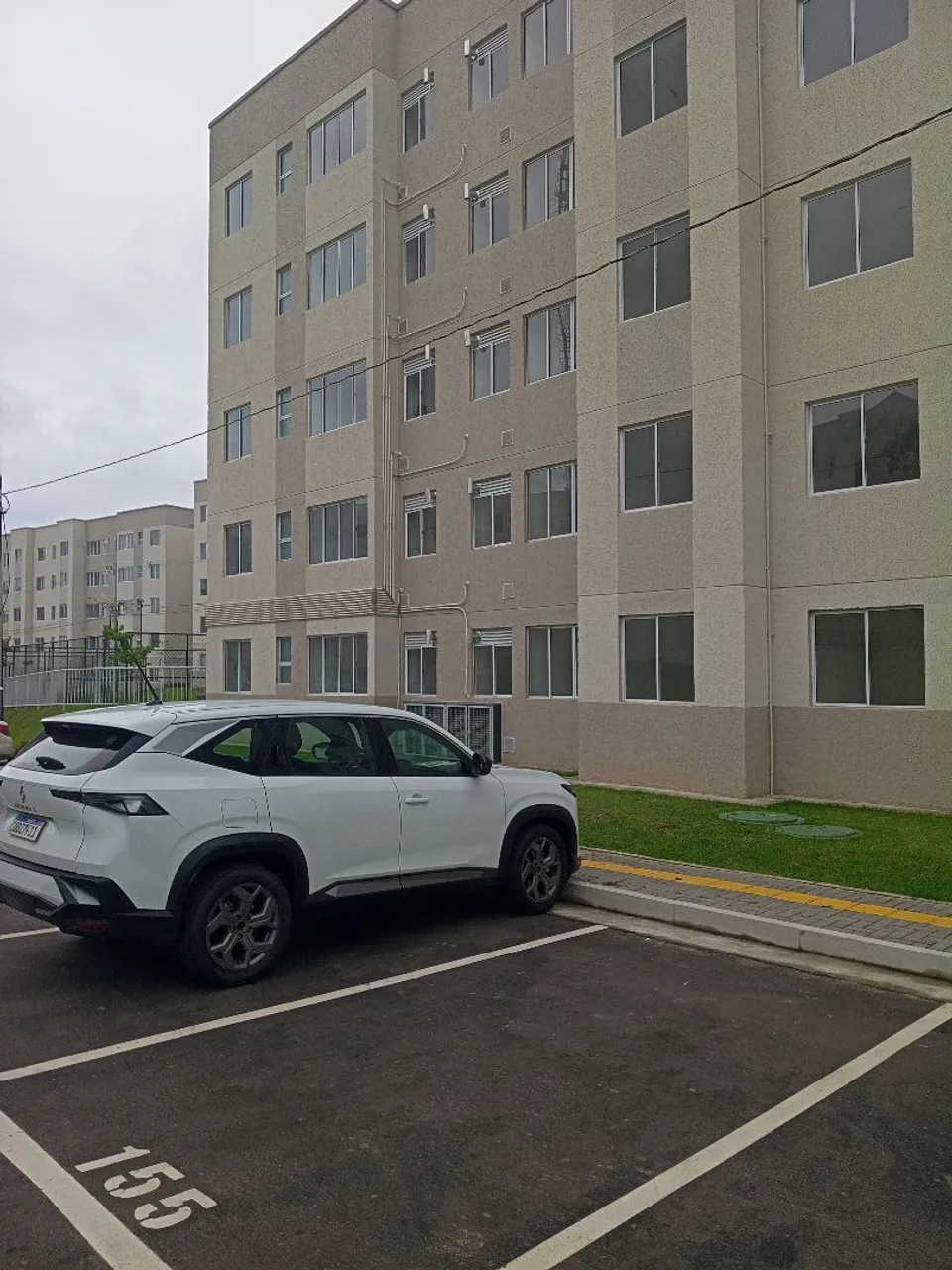 2-bedroom apartment in a building with a pool