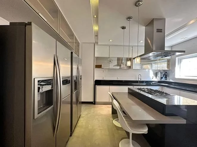 Casa mobiliada com 6 suítes e cozinha independente de 710 m² — photo 6