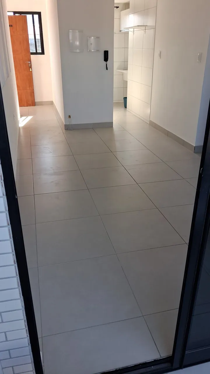 2-bedroom apartment in a building with a pool — photo 9