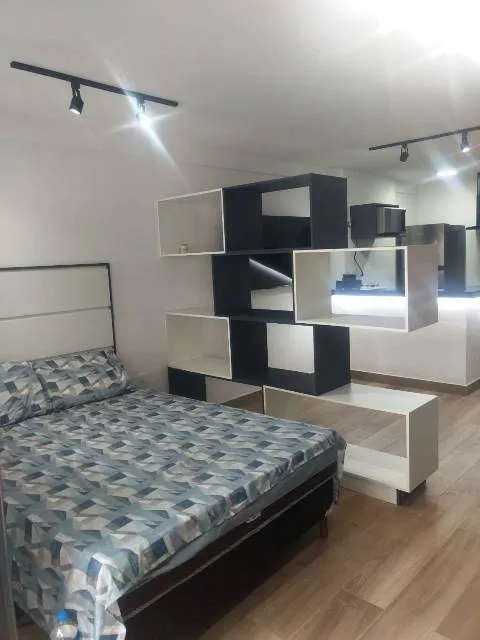 Apartamento de 1 quarto com cozinha aberta e varanda — photo 4