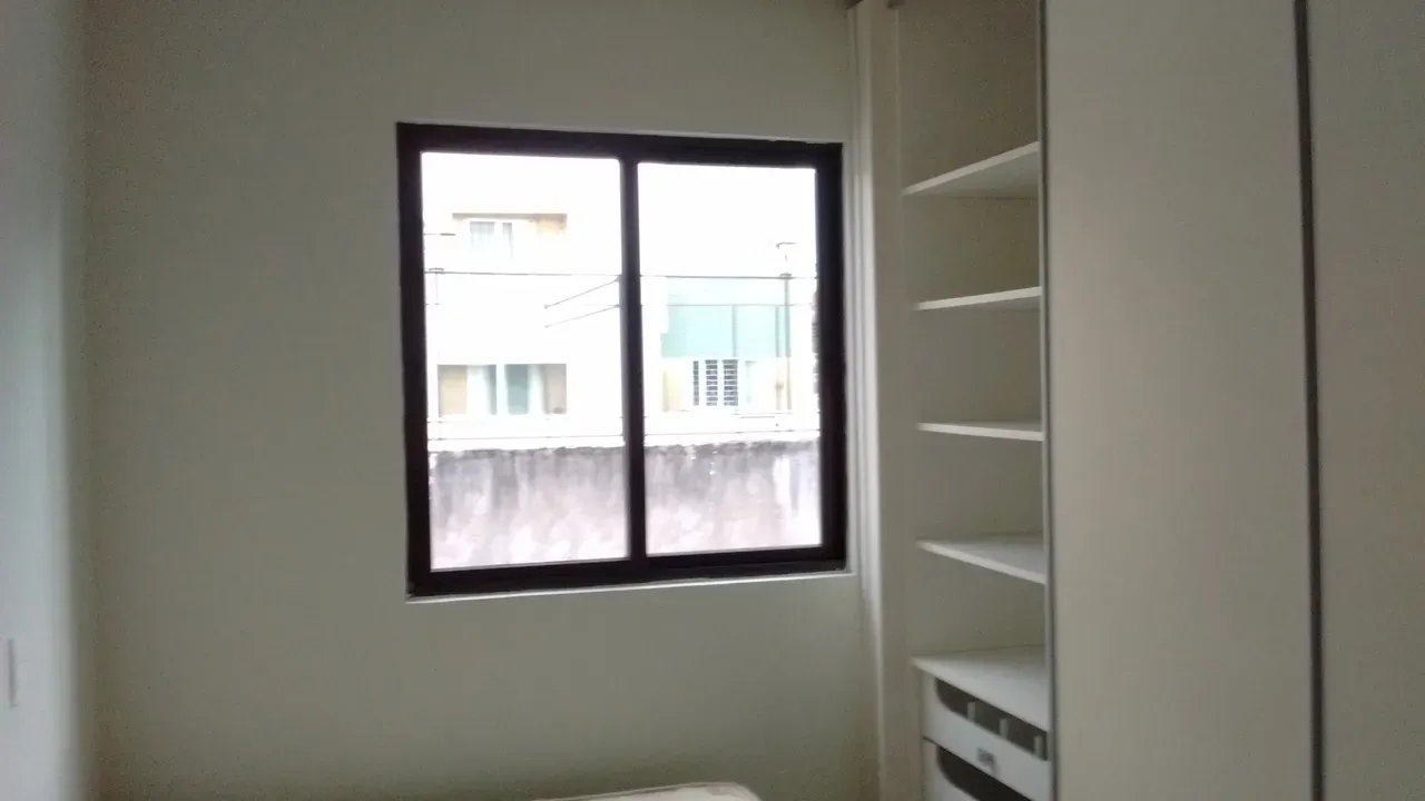One-bedroom apartment in a building with a gym
