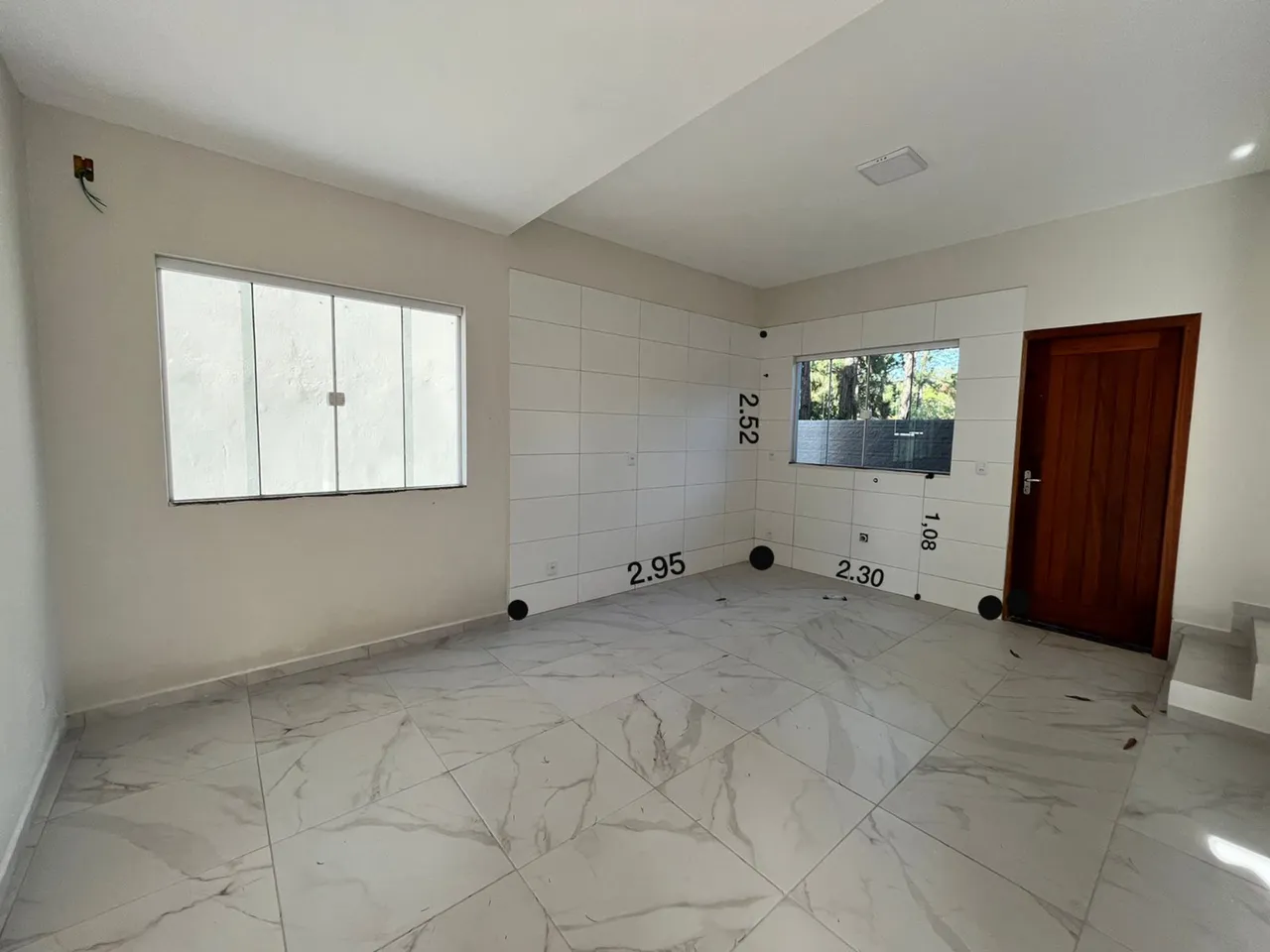 Casa com cozinha separada e fogão elétrico