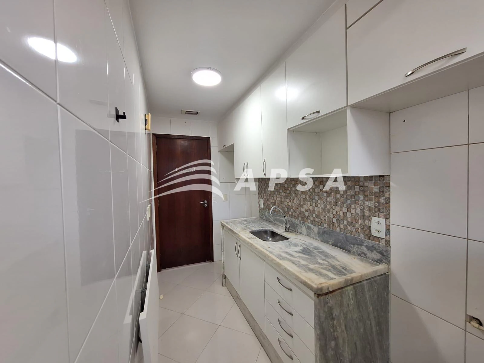 One-bedroom apartment in a building with a pool — photo 2