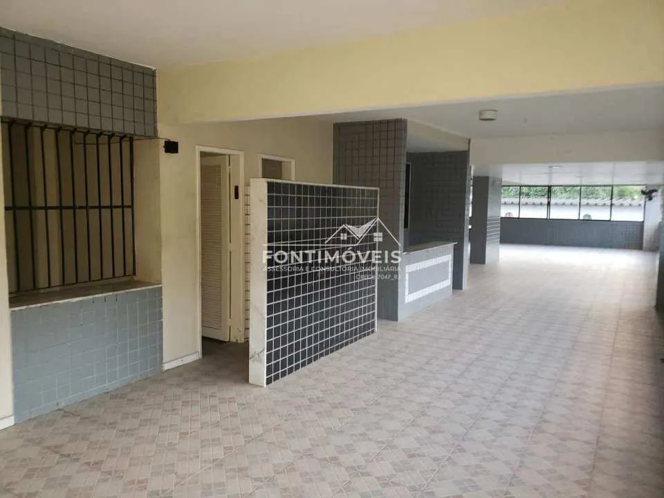 2-bedroom apartment in a building with a pool — photo 17