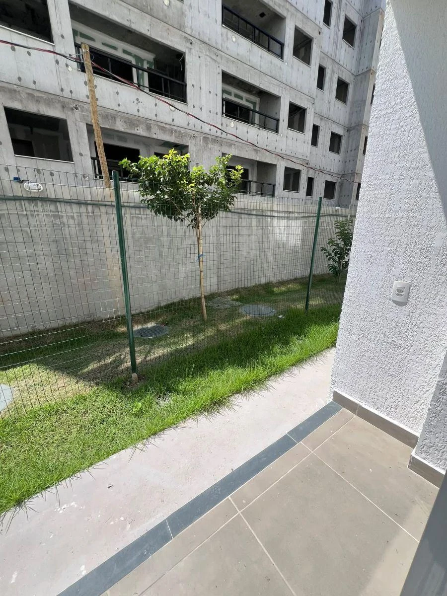 2-bedroom apartment in a building with a pool — photo 15