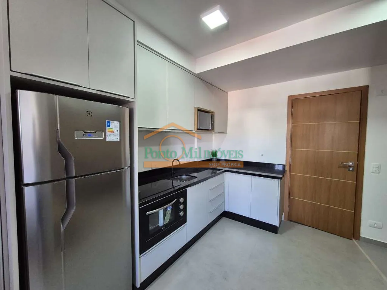 Furnished apartment with open-plan kitchen and balcony — photo 4