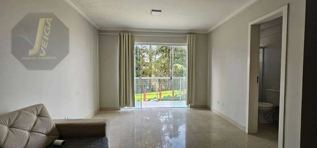 Furnished studio with 1 bedroom and a compact kitchenette
