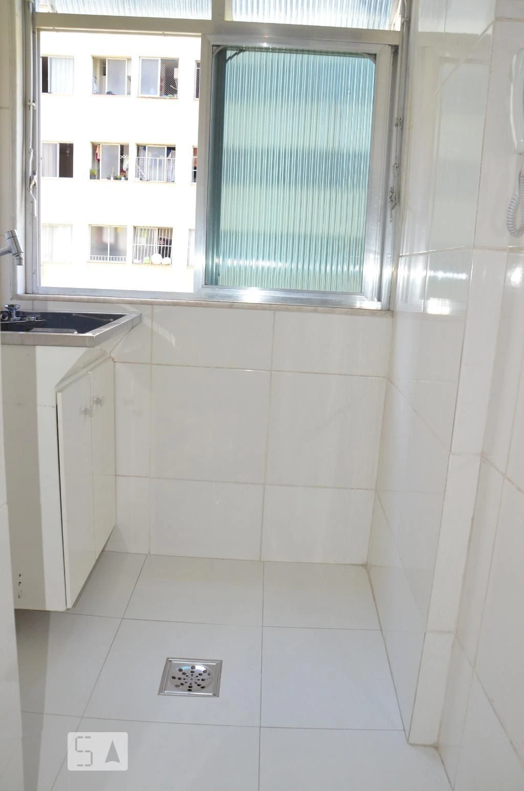 2-bedroom apartment in a building with a pool — photo 18