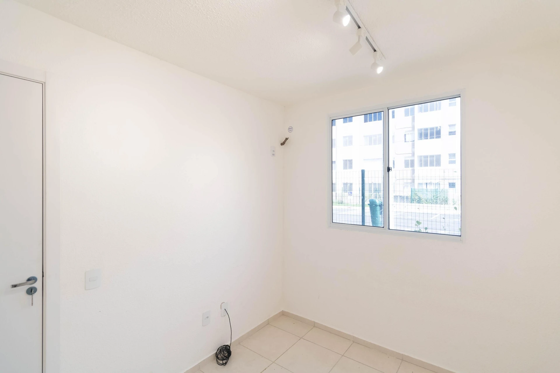 2-bedroom apartment in a building with a pool — photo 18