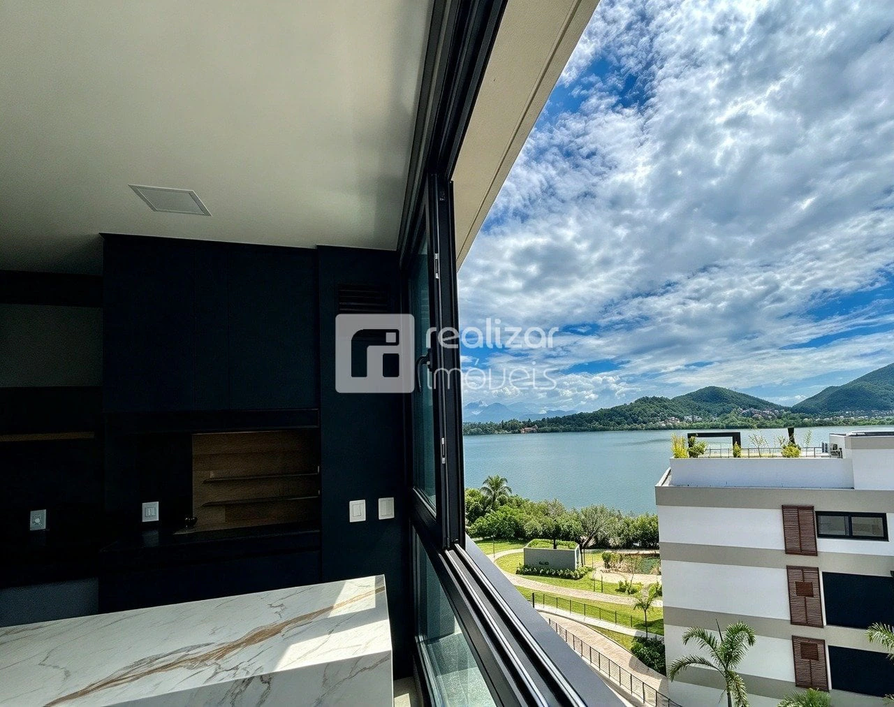 3-bedroom apartment with a grill on the balcony