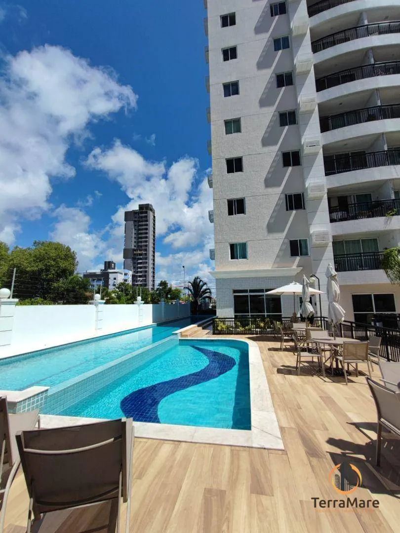2-bedroom apartment in a building with a pool — photo 8