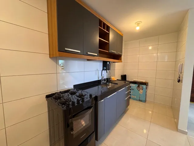 2-bedroom apartment in a building with a pool — photo 3