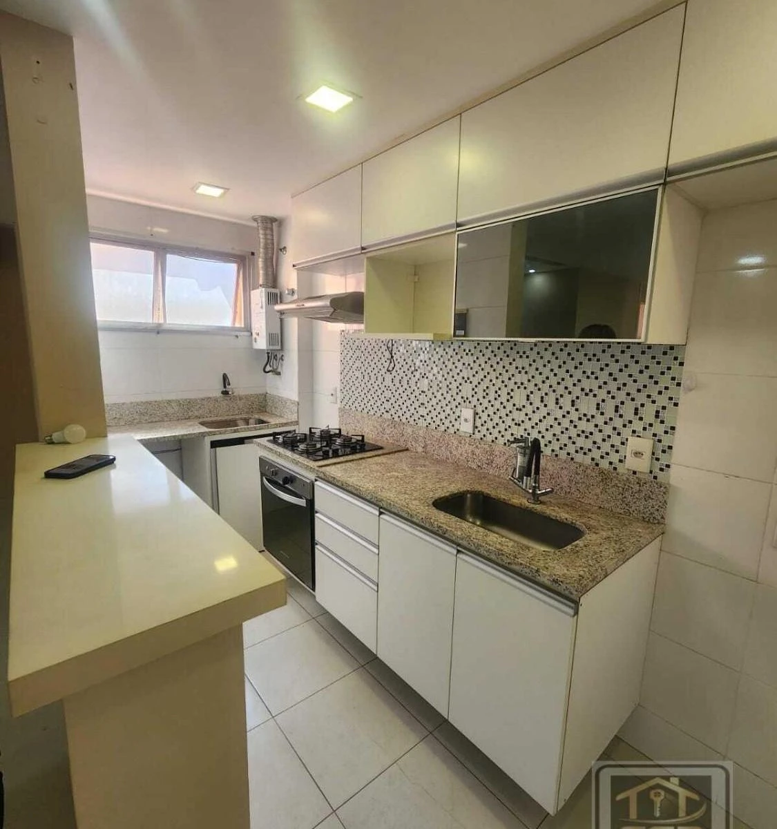 2-bedroom apartment in a building with a pool — photo 2
