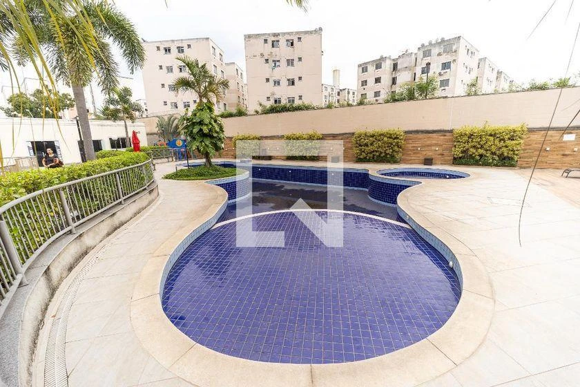 2-bedroom apartment in a building with a pool — photo 10