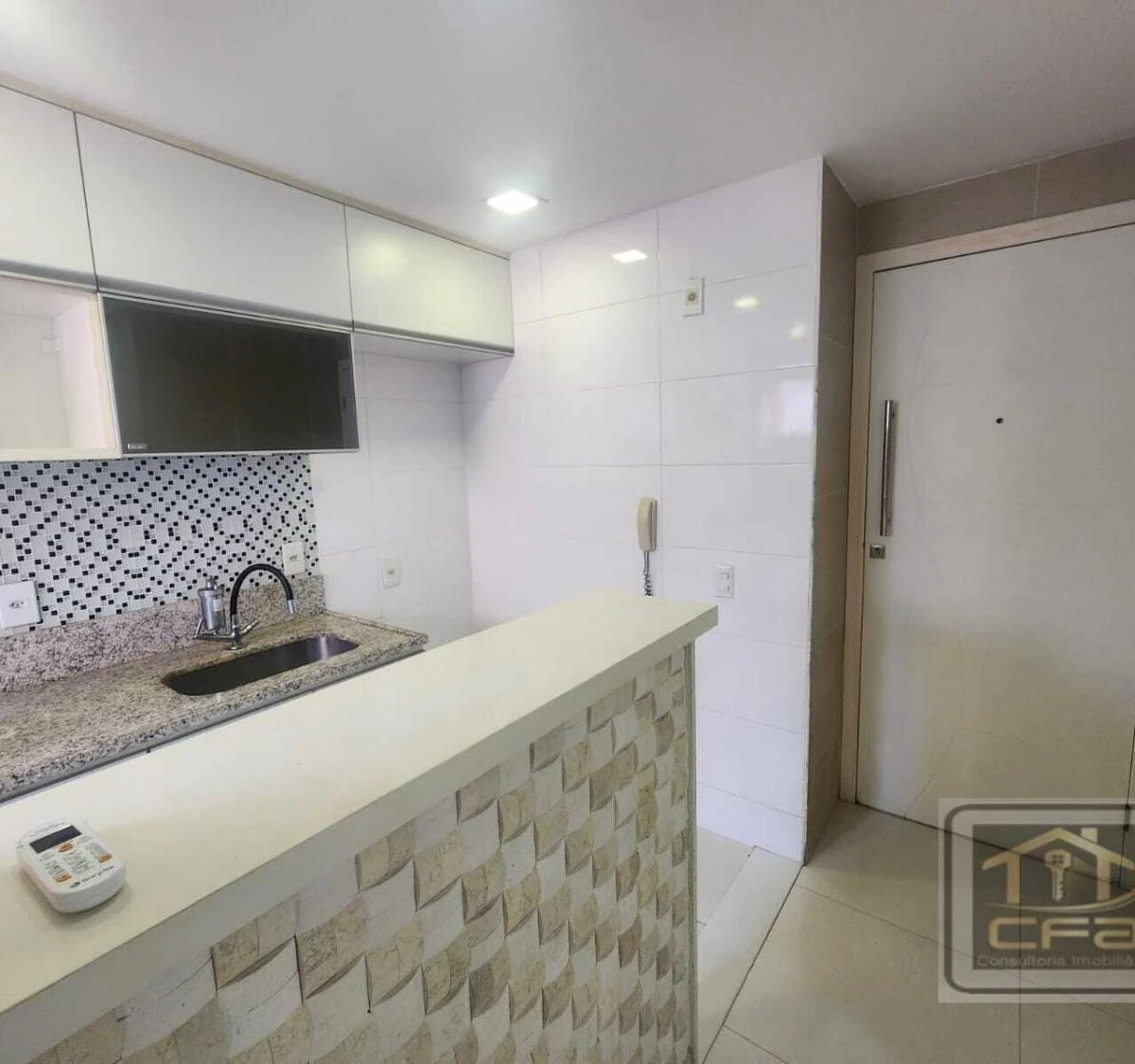 2-bedroom apartment in a building with a pool — photo 17