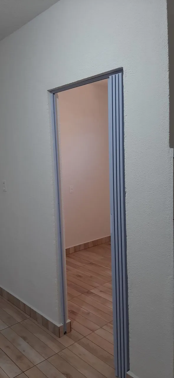 Studio-sized kitinete with 1 bedroom and compact kitchenette — photo 12