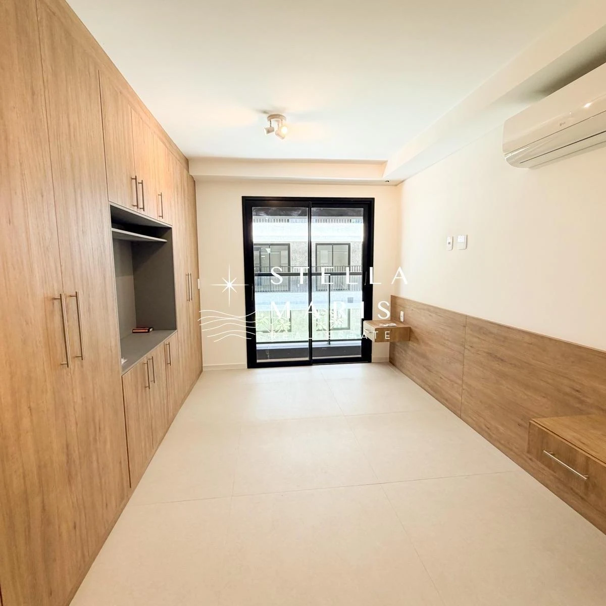 2-bedroom apartment in a building with a pool — photo 16