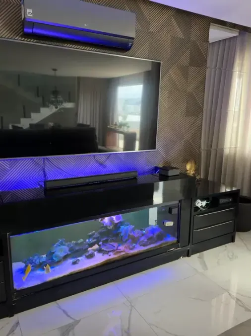 620 m² house with a glass-enclosed balcony and a water view