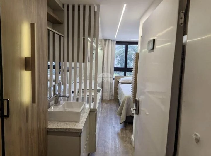 1-bedroom apartment with a laundry setup — photo 8