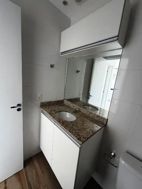 1-bedroom apartment with open-plan kitchen and parking — photo 7