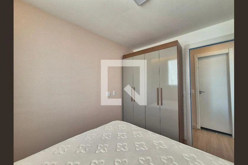 2-bedroom apartment in a building with a pool — photo 16