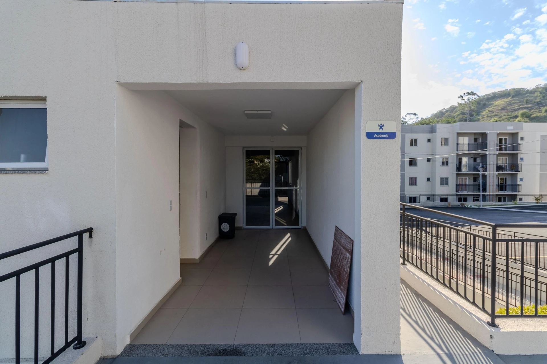 2-bedroom apartment in a building with a pool — photo 31