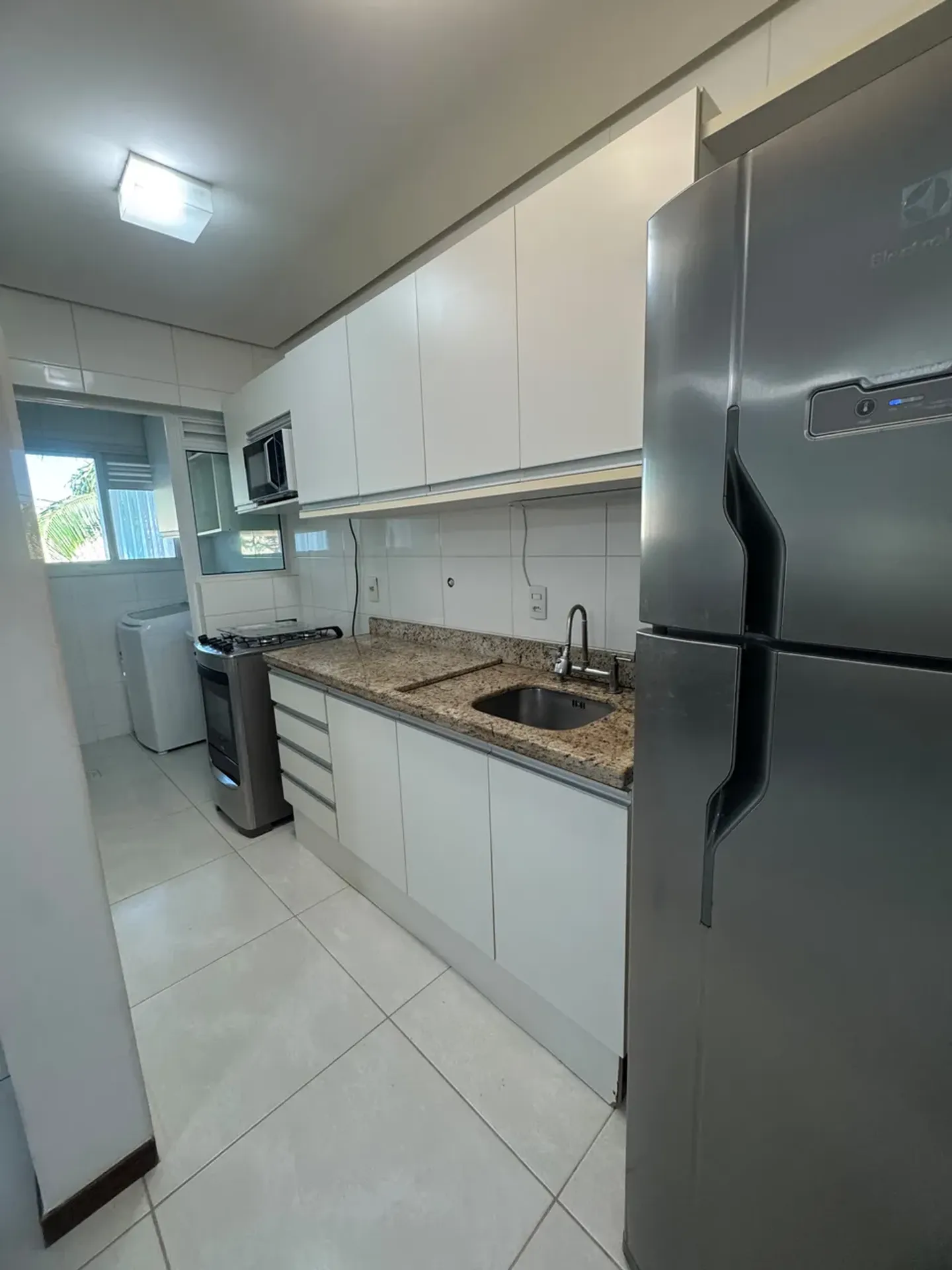 2-bedroom apartment in a building with a pool — photo 4
