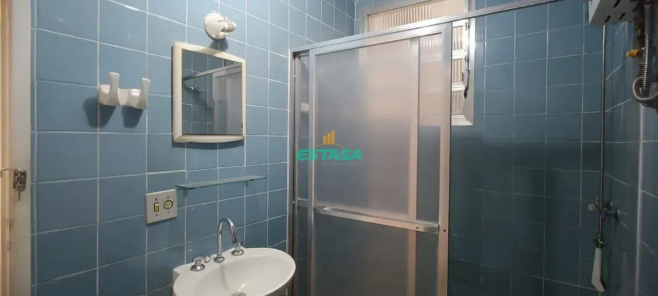 2-bedroom apartment in a building with a pool — photo 19